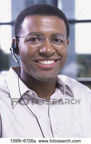 Stock Image - telephone, eyeglasses, phone, business, businessman. Fotosearch
