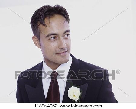 Stock Image - tie, Asian, flower, tuxedo, brunette. Fotosearch