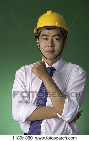 tie, industry, Asian, worker, Middle-aged, serious View Large Photo Image Stock Image - tie, industry, Asian, worker, Middle-aged, serious. Fotosearch