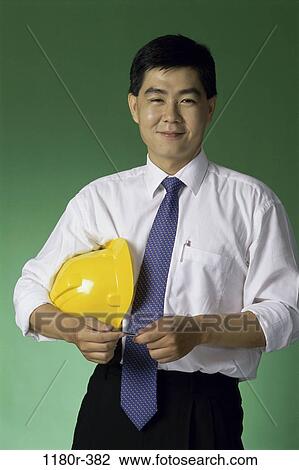 Stock Image - tie, industry, construction, Asian, worker, Middle-aged. Fotosearch