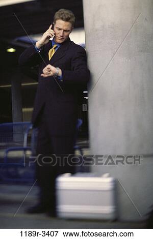 time, briefcase, talking, phone, watch, business View Large Photo Image Stock Photo - time, briefcase, talking, phone, watch, business. Fotosearch
