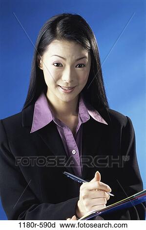Stock Image - woman, Asian, business, administrative, indoors, businesswoman, young adult. Fotosearch