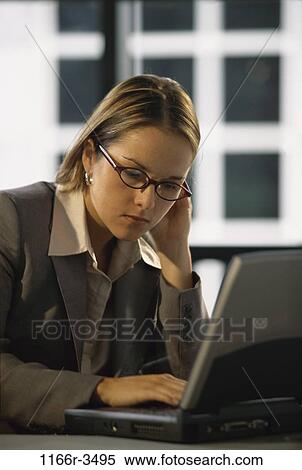 woman, eyeglasses, computer, laptop, business, serious, thinking View Large Photo Image Stock Photography - woman, eyeglasses, computer, laptop, business, serious, thinking. Fotosearch