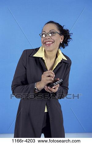 woman, eyeglasses, computer, laughing, planning, using, African-American View Large Photo Image Stock Image - woman, eyeglasses, computer, laughing, planning, using, African-American. Fotosearch