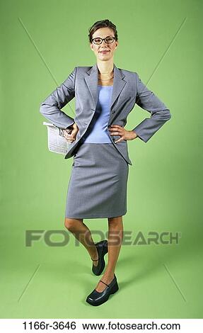 woman, glasses, newspaper, business, indoors, confidence, Caucasian View Large Photo Image Stock Photograph - woman, glasses, newspaper, business, indoors, confidence, Caucasian. Fotosearch