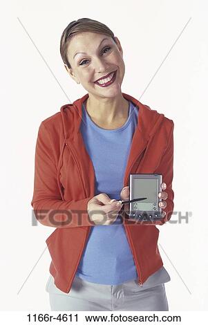 woman, planner, computer, holding, using, hold, organizer View Large Photo Image Stock Image - woman, planner, computer, holding, using, hold, organizer. Fotosearch