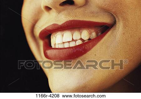 Stock Photo - woman, smiling, nose, teeth, mouth, body parts, lips. Fotosearch