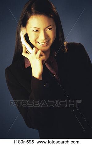 woman, telephone, talking, Asian, phone, business, indoors View Large Photo Image Stock Photography - woman, telephone, talking, Asian, phone, business, indoors. Fotosearch