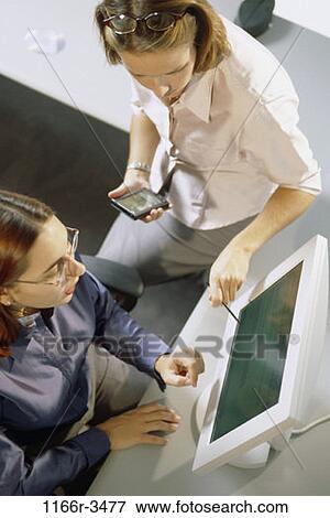 women, desk, computer, business, planning, using, casual View Large Photo Image Stock Photo - women, desk, computer, business, planning, using, casual. Fotosearch