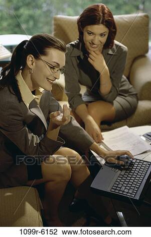 women, laptop, business, indoors, Caucasian, businesswomen View Large Photo Image Stock Image - women, laptop, business, indoors, Caucasian, businesswomen. Fotosearch
