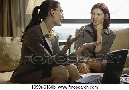 women, talking, computer, laptop, business, indoors View Large Photo Image Stock Image - women, talking, computer, laptop, business, indoors. Fotosearch