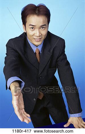 young adult, business, indoors, handshake, businessman, Asian View Large Photo Image Stock Photo - young adult, business, indoors, handshake, businessman, Asian. Fotosearch