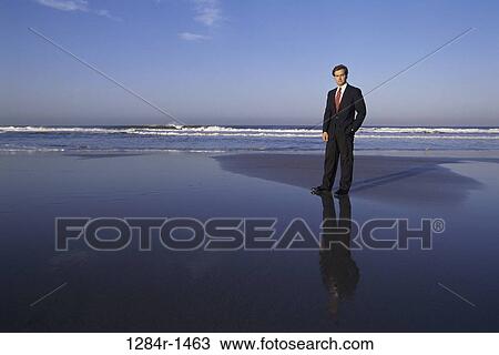 Stock Image - beach, business, businessman, Caucasian, young adult. Fotosearch