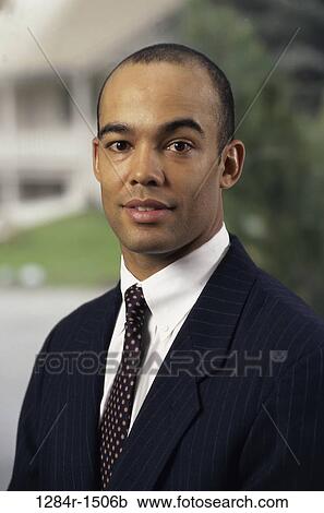 Stock Image - business, portrait, businessman, headshot, African-American. Fotosearch