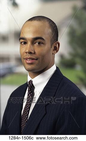 Stock Image - business, portrait, businessman, headshot, African-American. Fotosearch