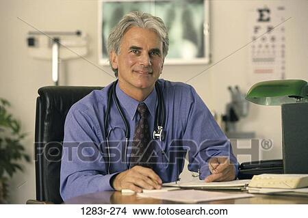 desk, doctor, stethoscope, medicine, Middle-aged, professional View Large Photo Image Picture - desk, doctor, stethoscope, medicine, Middle-aged, professional. Fotosearch