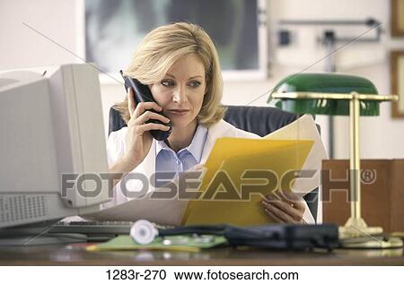 desk, woman, lamp, computer, phone, doctor, chart View Large Photo Image Stock Image - desk, woman, lamp, computer, phone, doctor, chart. Fotosearch
