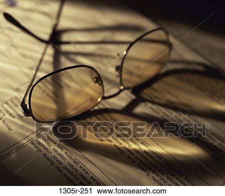 eyeglasses, book, square, still life, tinted, vision, sight View Large Photo Image Stock Image - eyeglasses, book, square, still life, tinted, vision, sight. Fotosearch