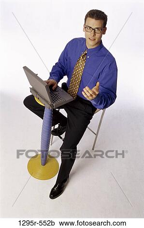 Stock Image - eyeglasses, computer, laptop, business, pedestal, using. Fotosearch