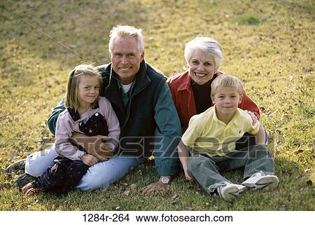 grass, people, sitting, outdoors, family, portrait, grandparents View Large Photo Image Picture - grass, people, sitting, outdoors, family, portrait, grandparents. Fotosearch