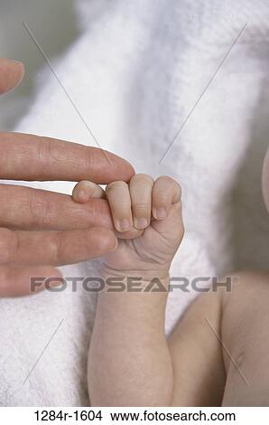 hands, baby, body parts, grasping, clinging, Caucasian View Large Photo Image Picture - hands, baby, body parts, grasping, clinging, Caucasian. Fotosearch