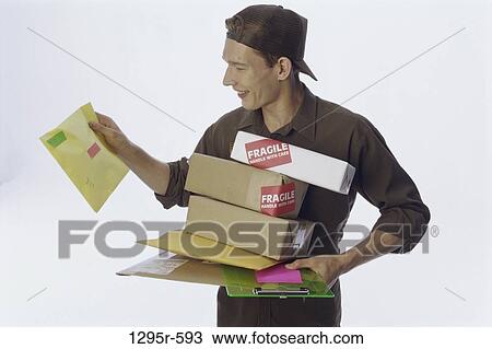 industry, delivery, occupation, Caucasian, packages, young adult View Large Photo Image Stock Image - industry, delivery, occupation, Caucasian, packages, young adult. Fotosearch