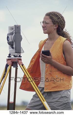 industry, woman, survey, outdoors, surveying, occupation View Large Photo Image Stock Photo - industry, woman, survey, outdoors, surveying, occupation. Fotosearch