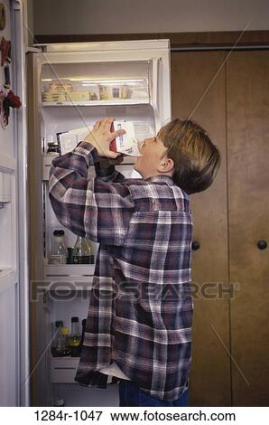 milk, refrigerator, drinking, boy, plaid, indoors View Large Photo Image Stock Photo - milk, refrigerator, drinking, boy, plaid, indoors. Fotosearch