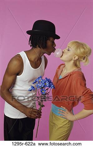 Stock Image - multiethnic, people, couple, flowers, bubble, gum. Fotosearch