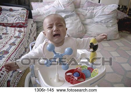 people, baby, crying, toys, sad, upset View Large Photo Image Stock Photography - people, baby, crying, toys, sad, upset. Fotosearch