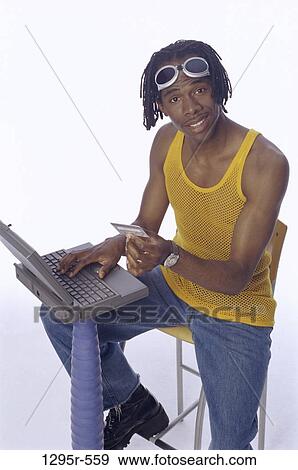 people, computer, laptop, sunglasses, shopping, shop View Large Photo Image Stock Photo - people, computer, laptop, sunglasses, shopping, shop. Fotosearch