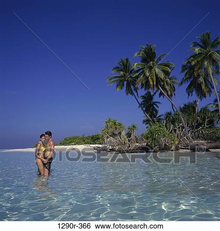 people, couple, beach, standing, stand View Large Photo Image Stock Photograph - people, couple, beach, standing, stand. Fotosearch