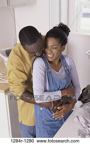 people, couple, hugging, affection, hug, indoors View Large Photo Image Stock Image - people, couple, hugging, affection, hug, indoors. Fotosearch