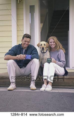 people, dog, couple, coffee, sitting, drinking, pet View Large Photo Image Picture - people, dog, couple, coffee, sitting, drinking, pet. Fotosearch