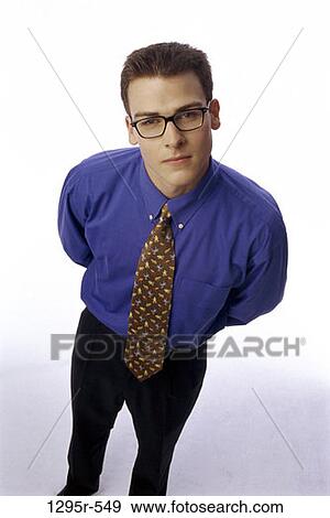 people, eyeglasses, business, curious, businessman, indoors View Large Photo Image Stock Photo - people, eyeglasses, business, curious, businessman, indoors. Fotosearch