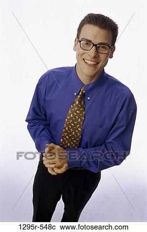 Stock Image - people, eyeglasses, business, businessman, indoors, Caucasian. Fotosearch