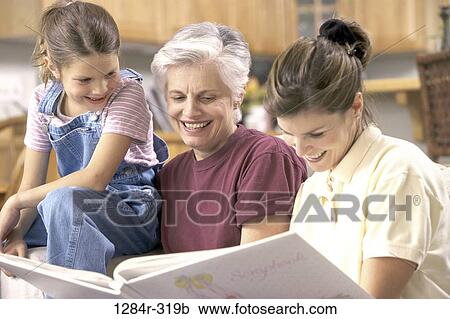 Stock Image - people, family, generations, daughters, grandchild, granddaughter, parents. Fotosearch