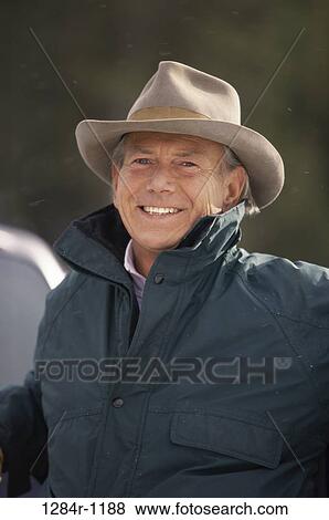 people, hat, senior, outdoors, Middle-aged, snowing View Large Photo Image Stock Photo - people, hat, senior, outdoors, Middle-aged, snowing. Fotosearch