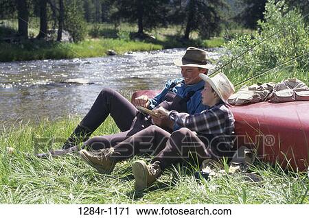 people, hats, outdoors, boat, resting, fishing View Large Photo Image Stock Image - people, hats, outdoors, boat, resting, fishing. Fotosearch