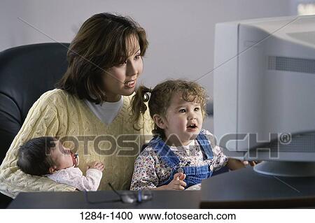 people, home, mother, computer, family, indoors View Large Photo Image Stock Image - people, home, mother, computer, family, indoors. Fotosearch