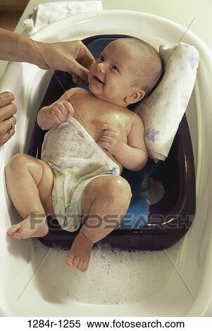 Stock Photography - people, mother, baby, family, tub, bathing, infant. Fotosearch