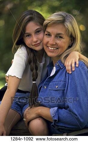 Stock Image - people, mother, outdoors, family, daughter, portrait. Fotosearch