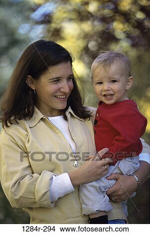 Picture - people, mother, outdoors, park, family, parent. Fotosearch
