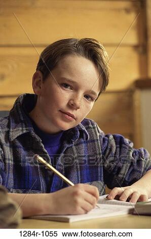 people, pencil, homework, book, studying, boy, writing View Large Photo Image Stock Photography - people, pencil, homework, book, studying, boy, writing. Fotosearch