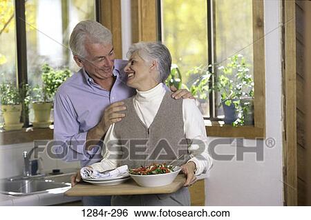 people, plants, windows, couple, senior, salad, kitchen View Large Photo Image Stock Photograph - people, plants, windows, couple, senior, salad, kitchen. Fotosearch