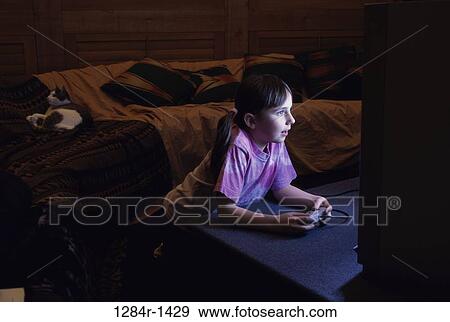 Stock Photo - people, playing, cat, pet, girl, entertainment. Fotosearch