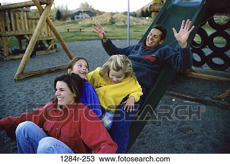 people, playing, sliding, playground, outdoors, family, play View Large Photo Image Stock Image - people, playing, sliding, playground, outdoors, family, play. Fotosearch