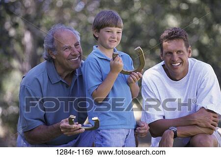 people, playing, three, outdoors, family View Large Photo Image Stock Photo - people, playing, three, outdoors, family. Fotosearch