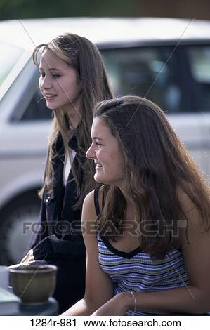 people, profile, sitting, outdoors, teens, Caucasian View Large Photo Image Stock Image - people, profile, sitting, outdoors, teens, Caucasian. Fotosearch