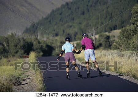 Stock Photo - people, road, couple, senior, outdoors, sports. Fotosearch